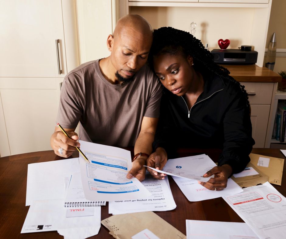 Family looking at bills